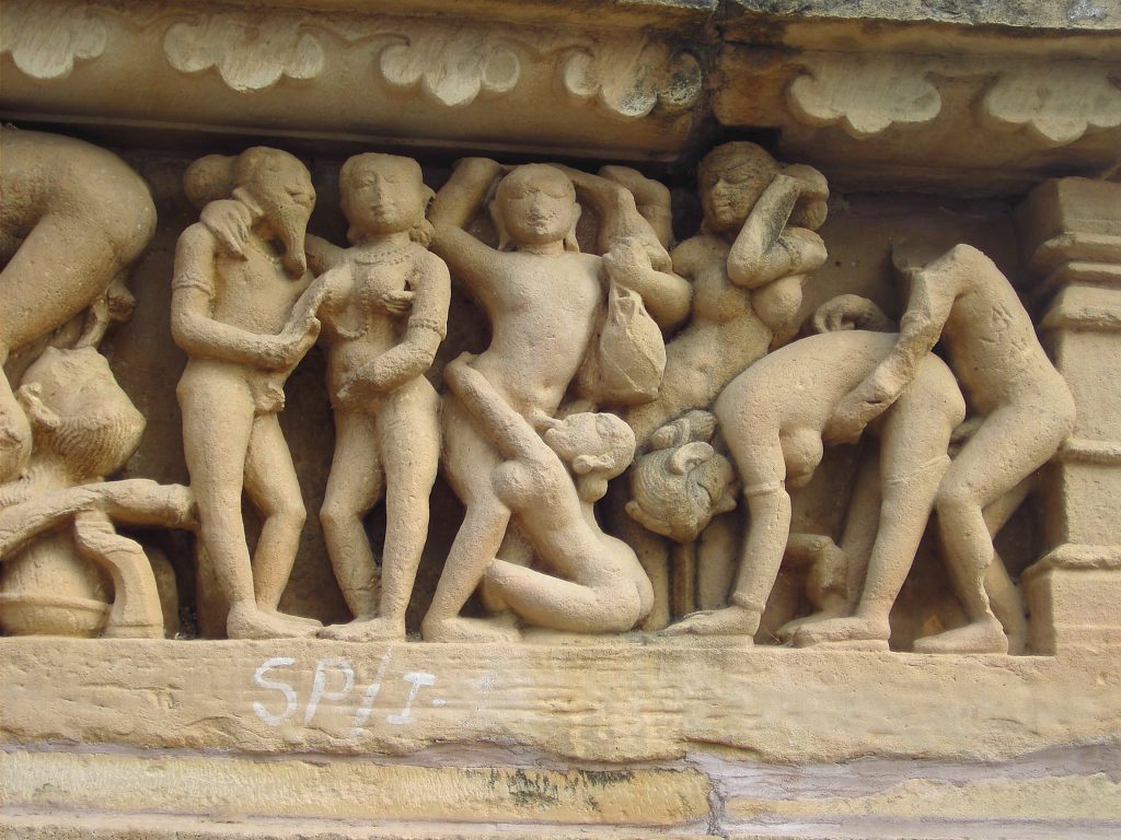 "Erotic carvings at the Jain temples of Kharjuraho in india. Graphic depiction of sexual intercourse." by denisbin is licensed under CC BY-ND 2.0.